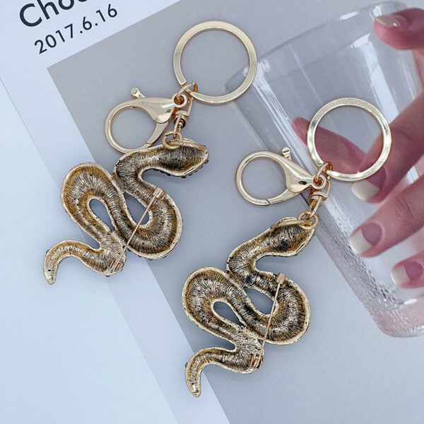 oly-6b9a4ee22cd81b011037494afa6dd7cb Wholesale Zodiac Diamond-embedded gradient snake keychain car bag pendant creative gifts for the year of birth