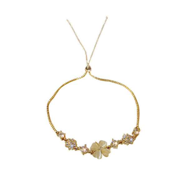 oly-6bc390e98059e57d93c7aeb283935fa0 Wholesale Korean Style Dongdaemun High-End Temperament Bracelet for Women Electroplated Diamond Cat's Eye Petals Flower Hand Jewelry Wholesale Fashion