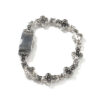 Wholesale Copper-set zircon cross flower bracelet with micro-painted zircon, elegant and sparkling jewelry.