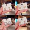 Wholesale Copper and silver needle Chanel-style stud earrings with diamonds, pearls, and zircon stones