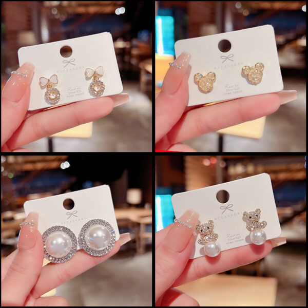 Wholesale Copper and silver needle Chanel-style stud earrings with diamonds, pearls, and zircon stones