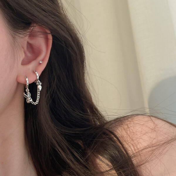 oly-6d35705ab80ed6416caf6e626c21dc6a Wholesale s925 sterling silver rabbit carrot single conjoined ear bone double ear hole earrings female minority design sense ear buckle