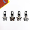 oly-6ec3bc542bada8332c8ef2952921573d Wholesale game series trendy skull butterfly keychain Halloween vintage pendant cold style all-match OLY Exclusive
