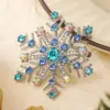Wholesale Graceful Christmas Gift Snowflake Brooch Fashion Lapel Pin European And American Trend Swan Flag Suit Lapel Flower Accessory