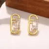 Wholesale Hypoallergenic Letter Stud Earrings For Women In Copper With KC Golden UV Plated Finish And Zircon Inlay