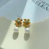 Wholesale PVD Coated Real Gold Plated 16K Gold White Gold Plated Flower 304 Stainless Steel Casual Modern Style Artistic Waterproof Non Tarnish Drop Earrings