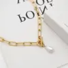 Wholesale 18K Gold OT Clasp Geometric Pearl Titanium Steel Women's Necklace With Round Plated Nylon Chain