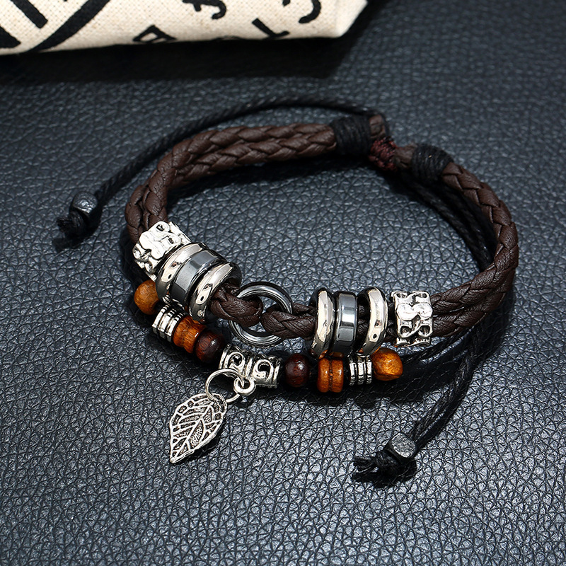 Wholesale Europe and the United States popular personality creative multi-layer woven leaf pendant lovers leather bracelet cross-border e-commerce jew