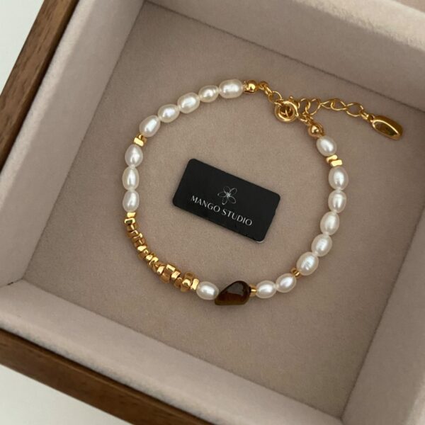 oly-72ae5a20dca3ee391af1a3208d25f79e Wholesale Denise Small Fresh High-end Sense Design Rice Pearl Tiger Eye Stone Adjustable Bracelet Niche Elegant Fashion Women