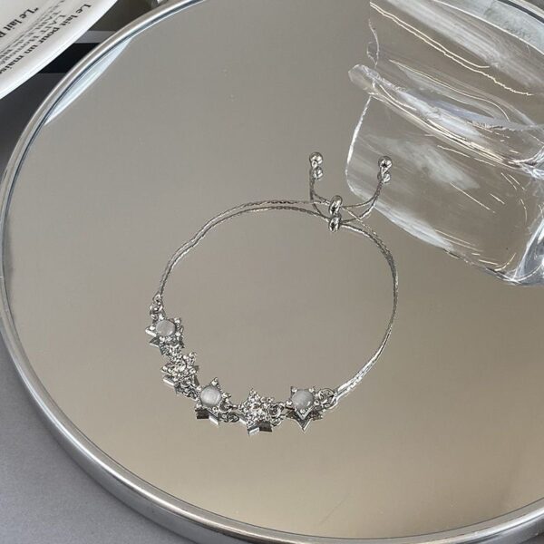 oly-733176c3c32d86cd99e5cd7e88fdafb6 Wholesale Cat's Eye Stone Zircon Star Pull-out Adjustable Bracelet Fashion Light Luxury Bracelet Niche Cold Style Bracelet for Women