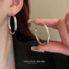 oly-735d2e46b1db93f9d894cf0064e31370 Wholesale French style metal circle earrings plain earrings trendy niche design unique temperament earrings for women