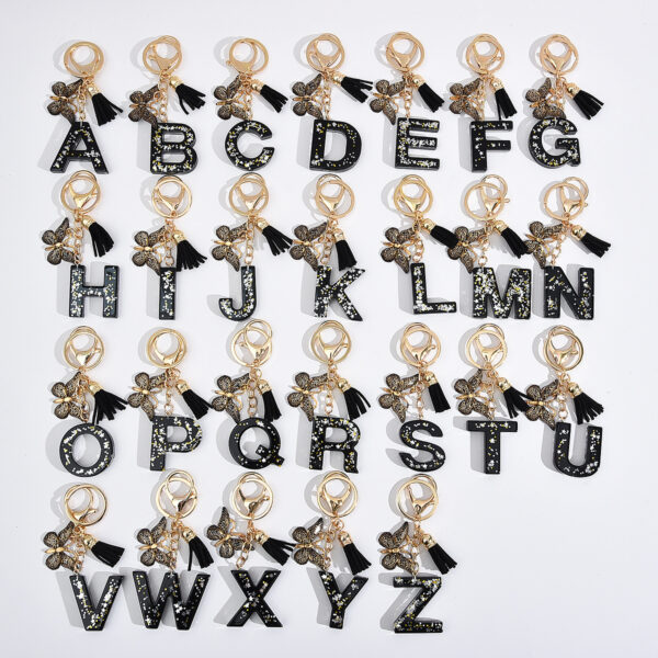 Wholesale resin black English letter car key chain pendant butterfly pendant tassel key chain decoration