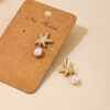 Wholesale 1 pair of summer temperament metal starfish pearl tassel ladies earrings earrings holiday style