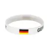 oly-771fe4203d1fe4d801e9763774819e41 Wholesale Multicolor Nordic Style Asymmetrical National Flag Wristband In Silica Gel With Nylon Chain Material For Couples