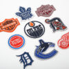 oly-7758cfc6ce9806e14fe93c8f90101065 Wholesale embroidered basketball team computer embroidered stickers clothing bag decorative stickers shoes and hats patch maple leaf letter stickers