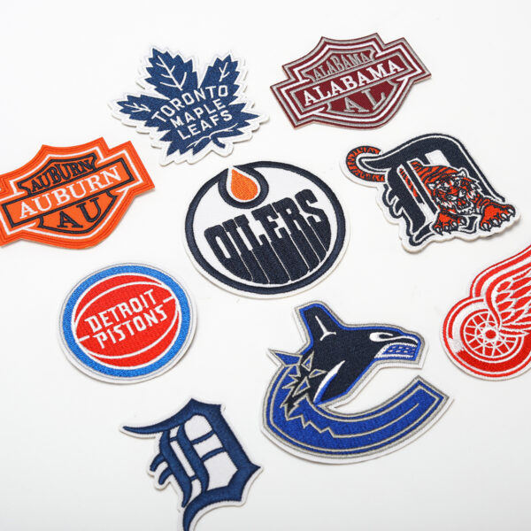 oly-7758cfc6ce9806e14fe93c8f90101065 Wholesale embroidered basketball team computer embroidered stickers clothing bag decorative stickers shoes and hats patch maple leaf letter stickers