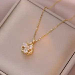 X1172 Gold Three-Leaf Flower Rotating Necklace
