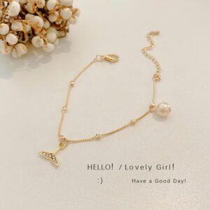 D002 Gold-Pearl fishtail bracelet