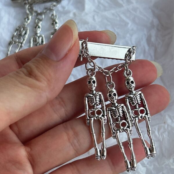 oly-7844bffb30fc9da13927a7802eacf71e Wholesale fun personality three skull frame hairpin student jewelry hair accessories hairpin manufacturers