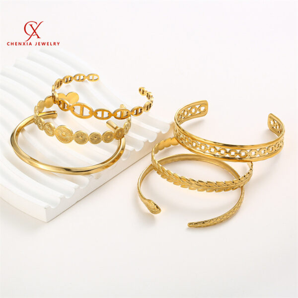 oly-784b68ce01612530948edfb641e59c21 Wholesale Simple Snake-shaped Titanium Steel Bracelet Personalized Fashion Retro Niche Stainless Steel Opening Bracelet for Women