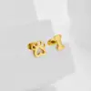 Wholesale Design Sensation Niche Student Sweet Cat Paw Dog Paw Bone Earrings Luxury Asymmetric Studs Golden Butterfly Cap Stainless Steel