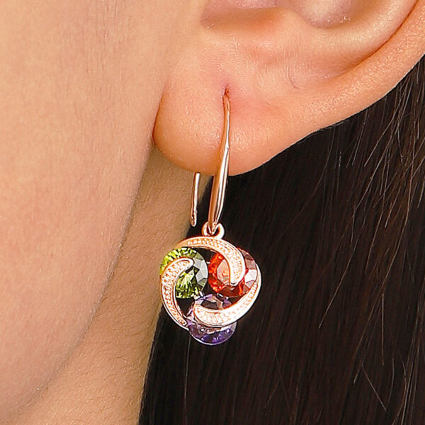 oly-78af59657153dee023495862ee8e0d71 Wholesale selling earrings temperament micro-inlaid zircon earrings female simple color diamond windmill earrings