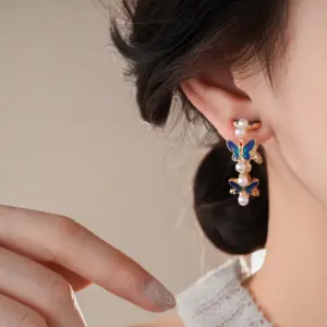 Wholesale Vintage Butterfly Pearl Water Drop Oil Silver Pin Round Ear Clip Feel Women's Earrings Suitable For Special Occasions