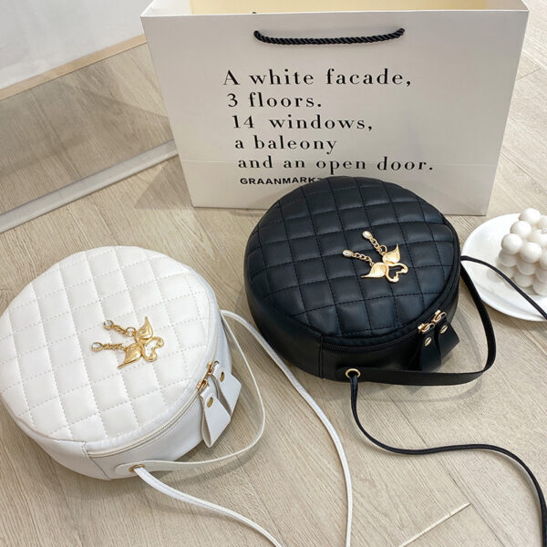 Wholesale Small round handbag, quilted bag, embroidered mini bag