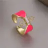 Wholesale Women’s Bow Tie Open Rings Featuring Enamel Craft And Zircon Inlay, Electroplated Copper Material