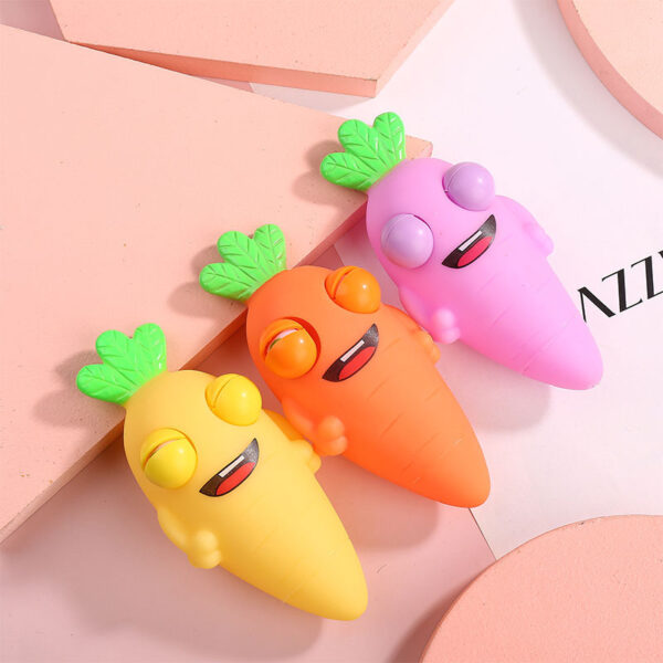 Wholesale Creative explosions squinting carrot decompression pinch music squeeze eye trick decompression vent fruit toys