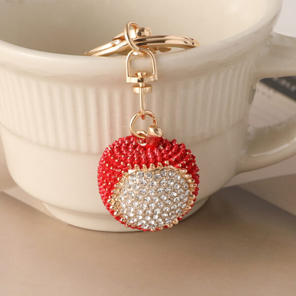oly-7b7d88425da02dbb06f0ea0b84159e21 Wholesale Diamond-encrusted lychee car keychain women's bag pendant metal key chain fruit pendant gift