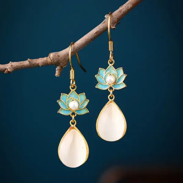 Wholesale Lotus Earrings For Women In Golden Plated Copper Featuring Freshwater Pearl Inlay