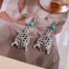 oly-7bb0cd07c07a40c46b5ef7c06b3ce7cf Wholesale hollow turtle earrings cute vintage personality turtle alloy turtle earrings jewelry