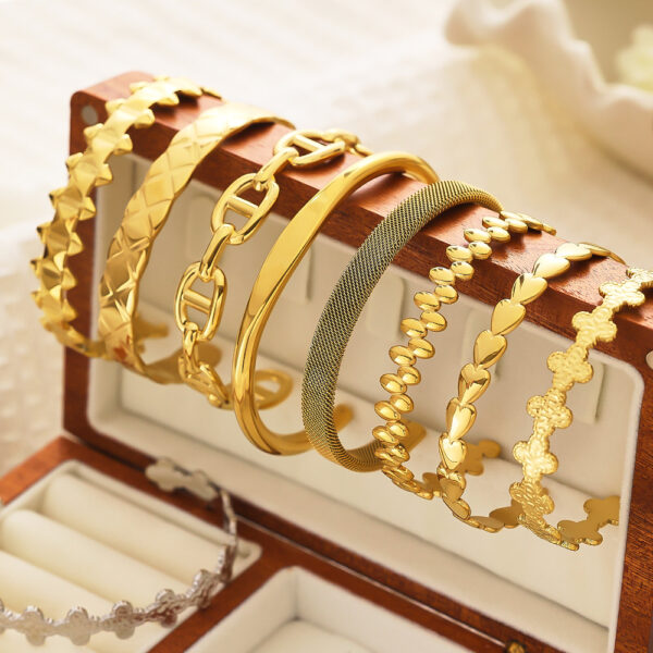 oly-7beefeadb278e43014ee86322add5620 Wholesale Retro Gold Bracelet Asymmetrical Titanium Steel Bracelet C-Shaped Opening Stainless Steel Adjustable Bracelet for Women