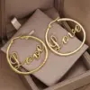 Wholesale Three-dimensional Love Earrings For Women In Copper With KC Golden Water Plating And 0.03µm Thickness