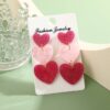 Wholesale color matching Valentine's Day acrylic love earrings simple pendant texture dopamine earrings