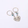 oly-7d71a53307381c64681676f7e4d11efc Wholesale stainless steel creative keychain pendant couple's two-petal heart Diamond key ring bag ornaments