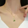 Wholesale 201 Stainless Steel Copper Flower Water Plating Vacuum Plating Zircon 18K Gold Plated 18K Gold Simple Style Coffee Bean Chain Transparent Gold Pendant Necklace