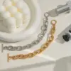 Wholesale PVD Coated Real Gold Plated 18K Gold Solid Color 304 Stainless Steel Sweet Waterproof Non Tarnish 304 Stainless Steel OT Clasp Toggle Clasp Closure Bracelets