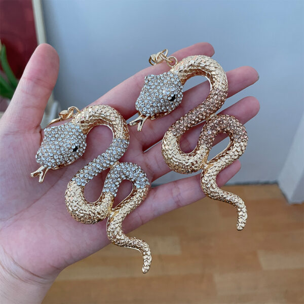 oly-7e99849108ddbade21e69e71fd22ac85 Wholesale Zodiac Diamond Snake Pendant Car Keychain Year of the Snake Gift Women's Bag Pendant Accessories Key Chain
