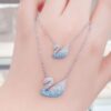 Wholesale Alloy diamond-encrusted Swarovski swan clavicle chain, gradient blue swan, rose gold, and black swan necklace.