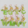 Wholesale 26 English Alphabet Keychain Pendant Green Star Glitter Resin Pendant Personality Key Chain