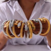 oly-8318a858ff11b7a4412bfb07c36a387e Wholesale Fashion Commuter Elastic Goose Throat Chain Design Sense Opening Bracelet Diamond-encrusted Spirit Snake Shape Titanium Steel Gold-plated Jewelry suit