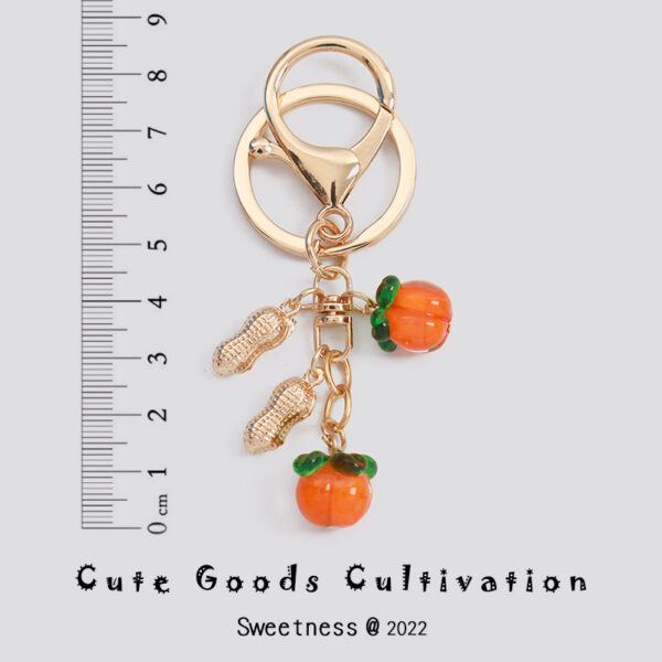 oly-83748076da0183983339d128f26525f8 Wholesale Persimmon Keychain Good Things Happen Persimmon Ruyi Sansheng III Bag Exquisite Hanging Accessories Mobile Phone Rope Earphone Box