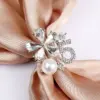 Wholesale Korean Style Pin Number Flower Butterfly Imitation Pearl Alloy Crystal Enamel Inlay Artificial Gemstones Women'S Brooches