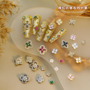 oly-8451109ebee4e5001673cd22d27294ca Wholesale Alloy nail art decorations, zircon lucky four-leaf clover with rhinestones, 3D nail decorations.