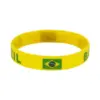 oly-84712f6cffdd551f7c1c5a9a33a0e94c Wholesale Multicolor Nordic Style Asymmetrical National Flag Wristband In Silica Gel With Nylon Chain Material For Couples