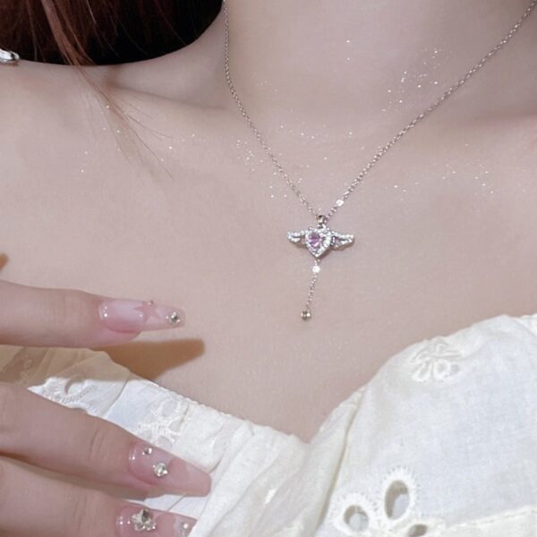 oly-84b088062ce541b16082a739afe7a7a1 Wholesale Cupid heart necklace female love Angel wings tassel romantic clavicle chain Qixi gift for girlfriend