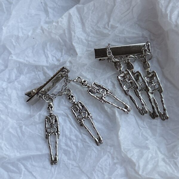 oly-84c8fdac2c0dd301ea74f835b3cc6e34 Wholesale fun personality three skull frame hairpin student jewelry hair accessories hairpin manufacturers