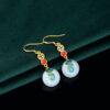 oly-84d713b6310045b1cd7f78e5193df4db Wholesale Niche Design Xiangyun Ping An Buckle Imitation Jade Elegant 925 Silver Needle Earrings